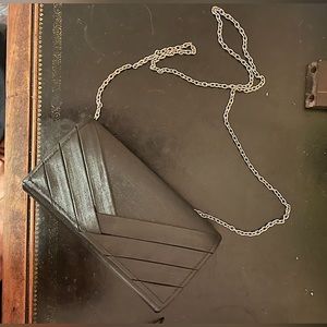 Claire’s Black Clutch Bag